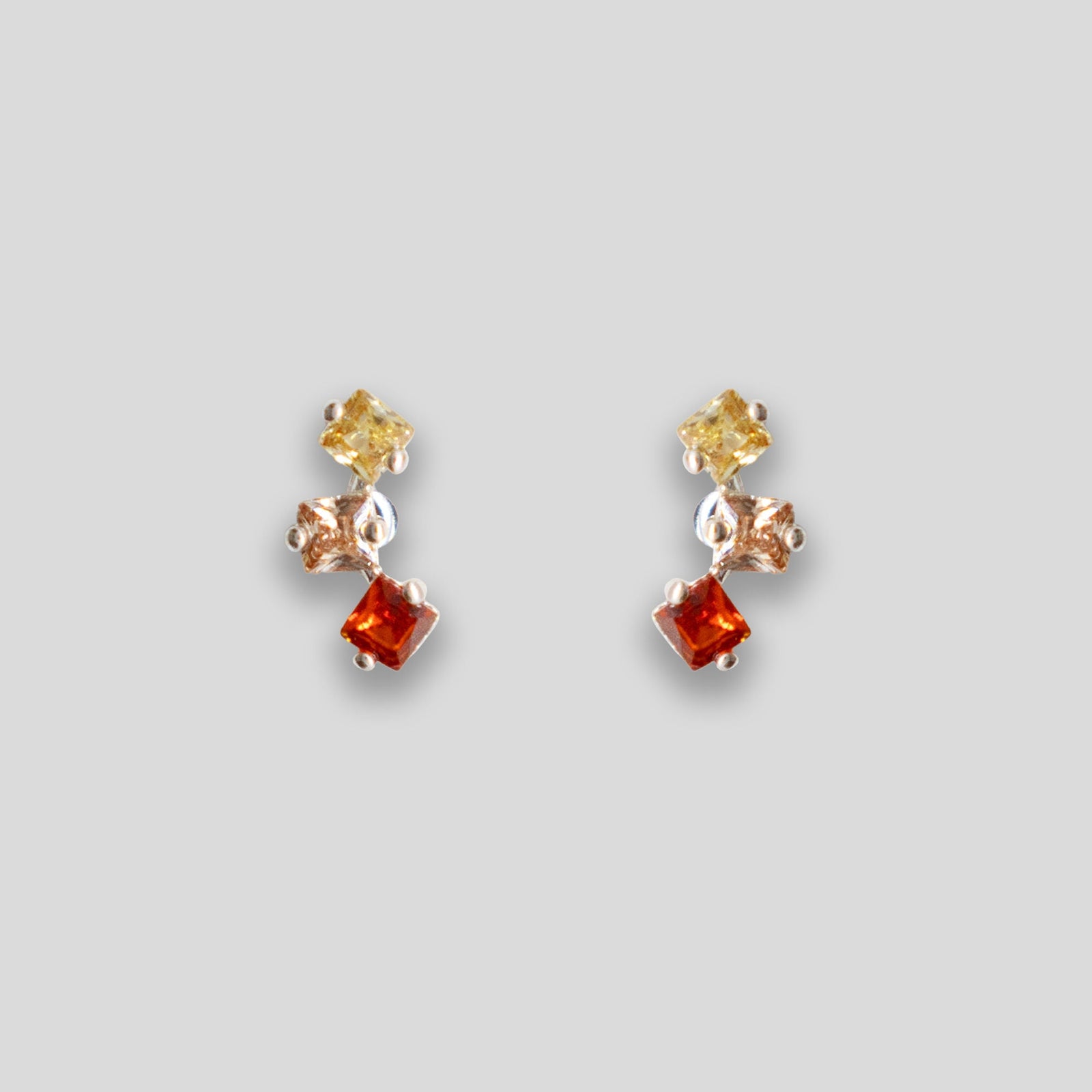 Triple Diamante Arc Studs - Yellow/Peach/Garnet