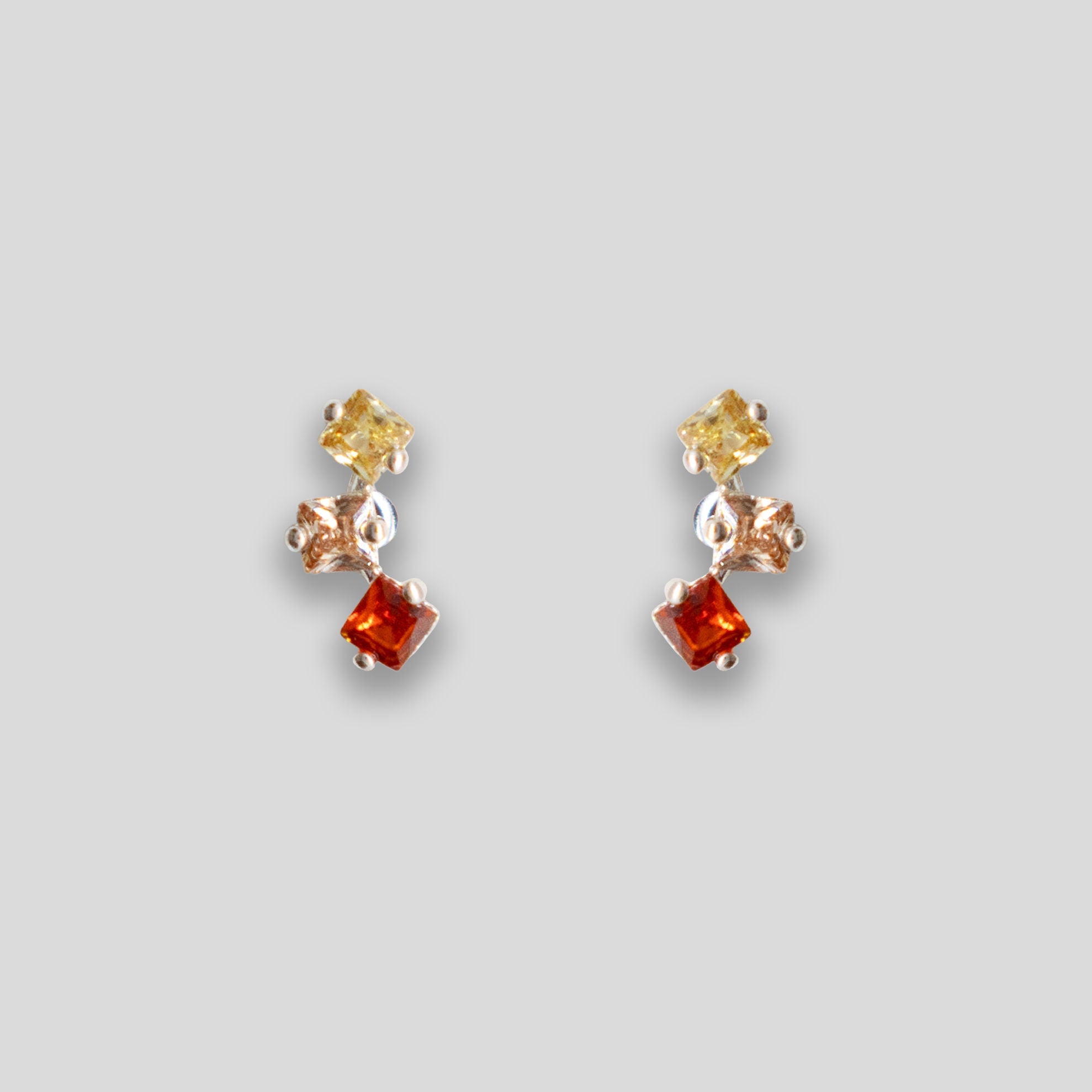 Triple Diamante Arc Studs - Yellow/Peach/Garnet